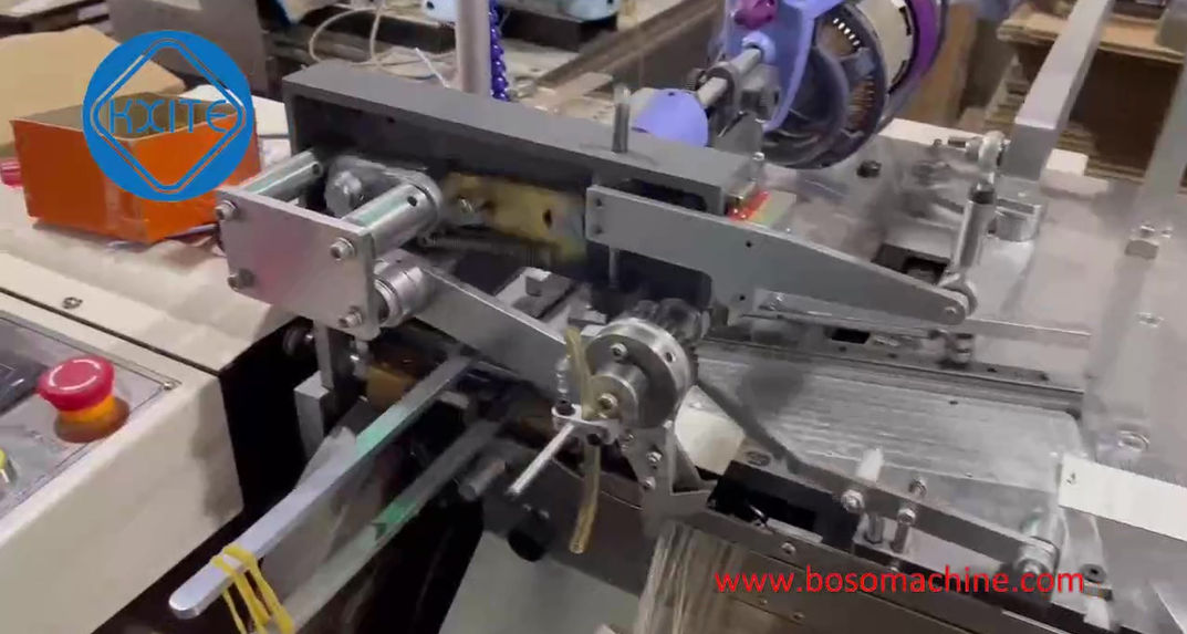 Double hang tag Stringer machine